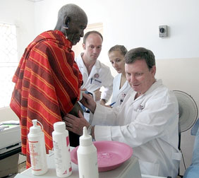 professor-cal-macpherson-conducting-ultrasound-examination professor-cal-macpherson-conducting-ultrasound-examination