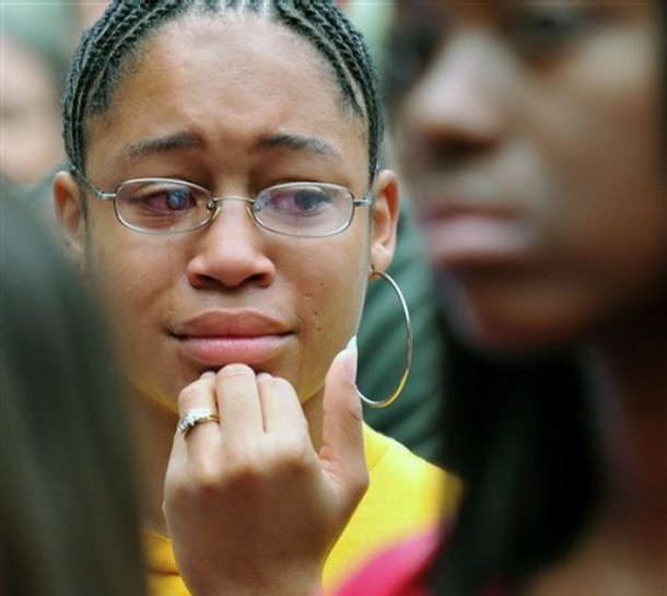 Baylor University freshman Keshia Neal, of Georgetown,Texas, cries during a silent march against racism, Friday, Nov. 14, 2008, in Waco Texas. About 150 students gathered across the campus in wake of the alleged racial incidents on Election Day where a rope resembling a noose was found hanging from a tree. On Thursday, Baylor's Interim President David Garland announced that the rope turned out to be a discarded rope swing and was not a noose. (AP Photo/Waco Tribune Hearld, Rod Aydelotte) - FILE PHOTO