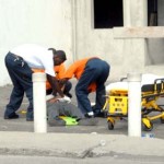 Ambulance attendant treat the male Student 1