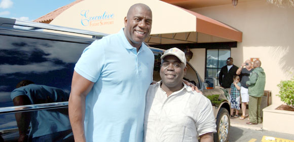 Davis meets with world basket ball icon Magic Johnson. 