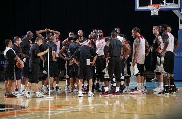 The Miami Heat huddles on court during pre-season training camp at the Atlantis, Paradise Island on Tuesday, October 1, 2013. The team arrived Monday, September 30; the camp ends October 3.