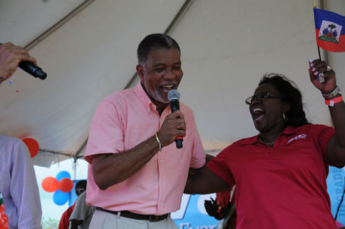 BTC CEO Leon Williams and Chief Marketing Officer Janet Brown all ready to celebrate at Haitian Flag Day. BTC was the title sponsor of the celebratory event. 