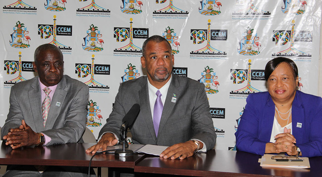 The Hon. Jerome Fitzgerald, Minister of Education, Science and Technology, (centre) is pictured along with Lionel Sands, Director of Education (left) and Donella Bodie, Permanent Secretary. (BIS photo/Letisha Henderson) 