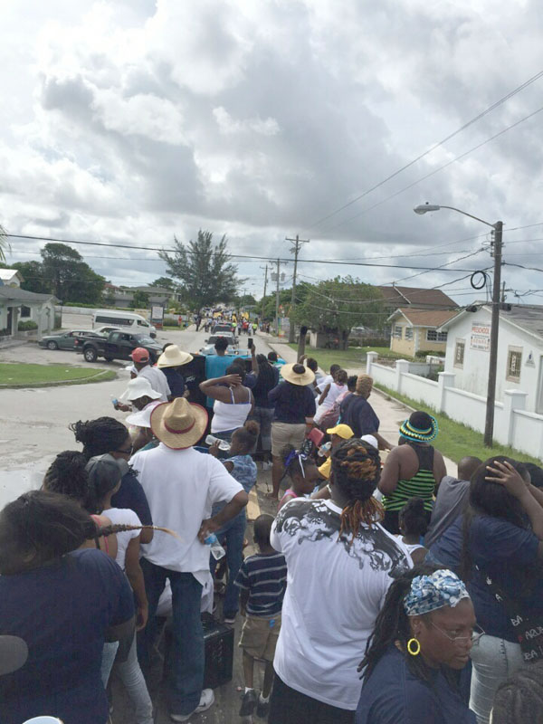 Hundreds march and road behind Prime Minister Rt. Hon. Perry Christie on Grand Bahama at the Labour Day events on that island Friday.