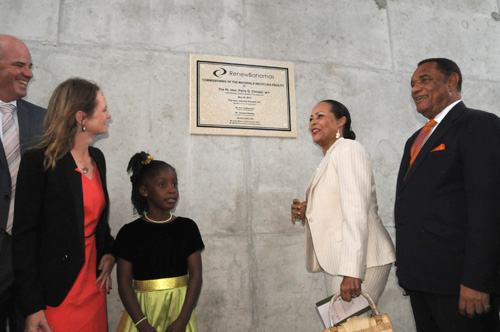 Prime Minister the Right Hon. Perry G. Christie unveils the plaque officially opening the Renew Bahamas Materials Recycling Facility, the Government-owned compound on Harold Road. The ceremony was held on the site on Thursday, May 28. Pictured L-R: President and CEO, Renew Bahamas, Mr. Gerhard Beukes and Mrs. Beukes; Mrs. Bernadette Christie and Prime Minister Christie. (BIS Photo/Peter Ramsay)