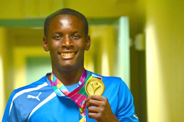 Special Olympics Athlete Cornel McClain celebrated his birthday 1 day early by turning in a GOLD MEDAL performance in the 100m backstroke (male 16-21) at the 2015 Special Olympics World Summer Games. Cornel got the ball rolling by picking up the first medal of these games for Team Bahamas. (Photo: Bahamas Special Olympics) 