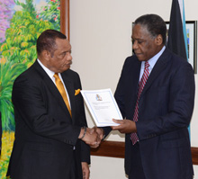 Dr. Marcus Bethel presents to Prime Minister Report on Hawksbill Creek Agreement.