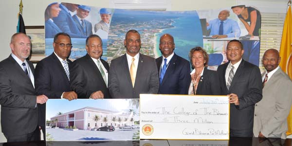 GBPA DONATES MONEY FOR DORMS - The Grand Bahama Port Authority on Thursday donated $3M for the construction of dorms and a multi-purpose facility for The College of The Bahamas Northern Campus. Shown from left during the presentation are: Mr. David Rulien, Sales Manager, US and Caribbean, ALMACO Construction; Dr. Michael Darville, Minister for Grand Bahama; Dr. Rodney Smith, president of The College of The Bahamas; Jerome Fitzgerald, Minister of Education, Science and Technology; Alfred Sears, chairman of COB Council; Sarah St. George, vice-chairman, Grand Bahama Port Authority; Ian Rolle, president, Grand Bahama Port Authority; and Alfred Jones, COB Council member and vice- president of Building and Development Services, GBPA. (BIS Photo/Vandyke Hepburn)