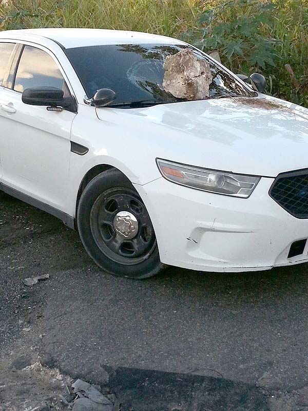 Police cruiser destroyed after police attempted to arrest a suspect and shot him fatally.