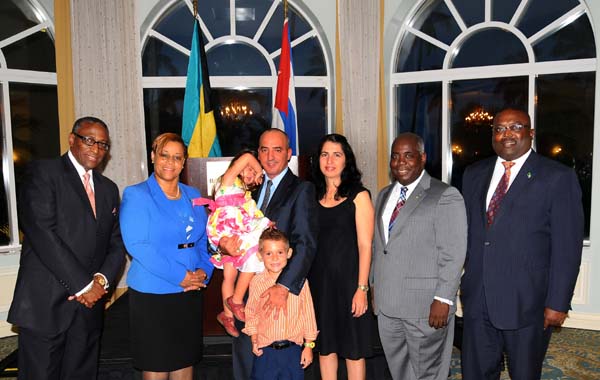 At the Farewell Reception in honour of Cuban Ambassador His Excellency Ernesto Soberon Guzman on Wednesday at the British Colonial Hilton are, from left: Minister of Agriculture and Marine Resources, the Hon. V. Alfred Gray; Minister of Financial Services, the Hon. Hope Strachan; Ambassador Guzman, Mrs. Guzman and their children; Deputy Prime Minister and Minister of Urban Development, the Hon. Philip Davis; and Minister of State in the Ministry of Works, the Hon. Arnold Forbes. (BIS Photo/Kemuel Stubbs)