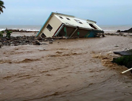 A home being swept away by flooding in Dominica. The Dominican government is overwhelmed by disaster relief efforts and asking for aid. BTC is asking Bahamians to text “HELP” to “5200” to donate a dollar to relief efforts.