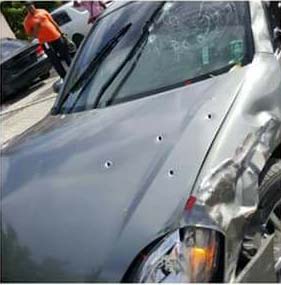 Francis' vehicle shot up yesterday by killers.