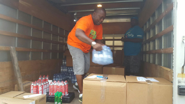 BTC teams offloading supplies for residents in affected islands in the Southern Bahamas.