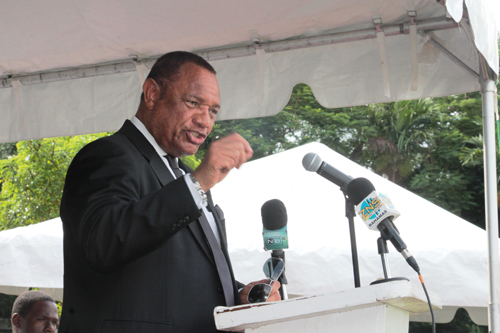 Prime Minister and Minister of Finance the Rt. Hon. Perry Christie speaks during a National Heroes Day Ceremony, on October 12, 2015, at the Botanical Gardens. (BIS Photo/Eric Rose)