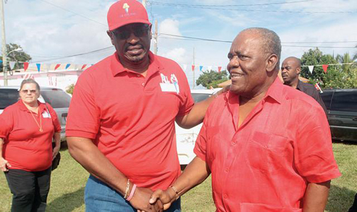 Dr. Hubert Minnis greets Former PM Hubert Ingraham.