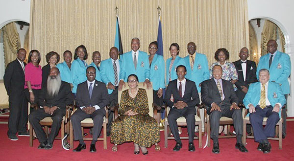 Minister of Youth, Sports and Culture the Hon. Dr. Daniel Johnson (second from left) and Her Excellency Dame Marguerite Pindling, Governor General, centre, are pictured with the National Sports Hall of Fame Class of 2015 honourees, and their representatives, at Government House during the Induction Ceremony. (BIS Photo/Raymond A. Bethel, Sr.)