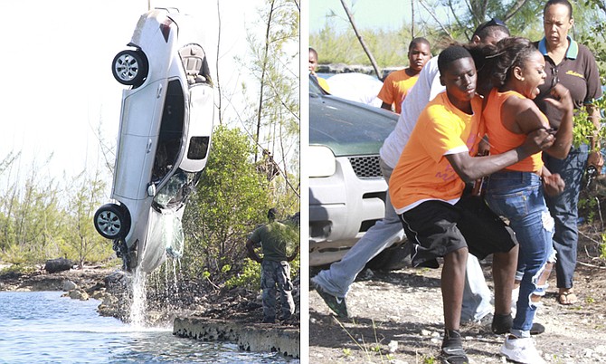 Shots of that silver Honda vehicle which police uncovered submerged in the Sea Breeze Canal on Saturday. photo by Tribune242.com