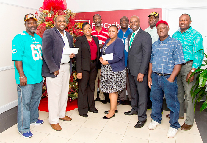L-R – Front Row: Kimsley Ferguson, Coordinator, Body of Christ; Glen Knowles, Chairman, Fancy Dancers; Beulah Arthur, CIBC FirstCaribbean Country Treasurer; Christina “Muffin” Fernander, Vice Chair, One Family; Sean Blyden, CIBC FirstCaribbean Shirley Street Branch Manager; Eric Knowles, Chairman, Prodigal Sons. Back Row: Wellington Henfield, Chairman, Redland Soldiers; Henry Higgins, Leader, Conquerors for Christ; Toby Austin, Chairman, Saxons; Winston Rolle, Chairman, Music Makers. 