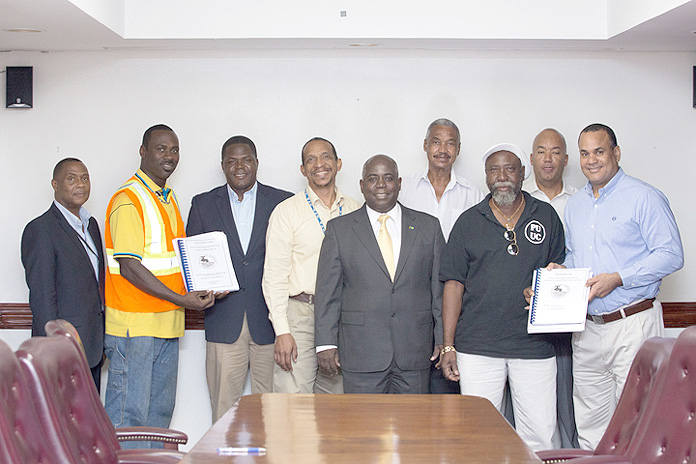 Pictured are: DPM DAVIS, MINISTER HALKITIS, MINISTER KHAALIS ROLLE, CHAIRMAN MILLER, RICARDO MONCUR, Personal Assistant to DPM, GREGORY MILLER, President APEX; JAMES ROLLE, President PROLINE; ROBERT DEAL, Deputy General Manager;GLEN LAVILLE, General Manager