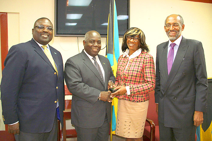 American Bar Association President Paulette Brown meets Deputy Prime Minister and Minister of Works and Urban Development the Hon. Philip Davis, centre, in a courtesy call at the Ministry’s offices, January 21, 2016. Also pictured is Minister of State in the Ministry of Works and Urban Development Arnold Forbes, left, and Dr. Peter Maynard, head of the Law Department at the College of The Bahamas. Ms. Brown is a participant in the two-day, 4th Annual Arbitration and Investment Summit-Caribbean, Latin American and other Emerging Markets at COB library that opens January 22. (BIS Photo/Patrick Hanna) 