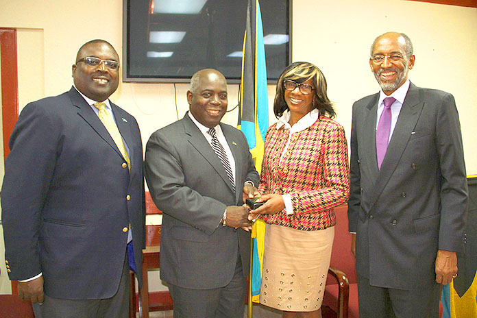 American Bar Association President Paulette Brown meets Deputy Prime Minister and Minister of Works and Urban Development the Hon. Philip Davis, centre, in a courtesy call at the Ministry’s offices, January 21, 2016. Also pictured is Minister of State in the Ministry of Works and Urban Development Arnold Forbes, left, and Dr. Peter Maynard, head of the Law Department at the College of The Bahamas. Ms. Brown is a participant in the two-day, 4th Annual Arbitration and Investment Summit-Caribbean, Latin American and other Emerging Markets at COB library that opens January 22. (BIS Photo/Patrick Hanna)