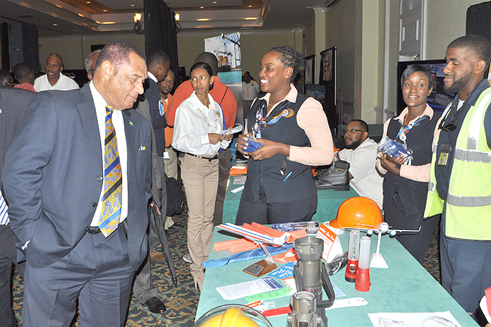 Prime Minister Christie views one of the companies of the Port Authority.(BIS Photo/Andrew Miller)