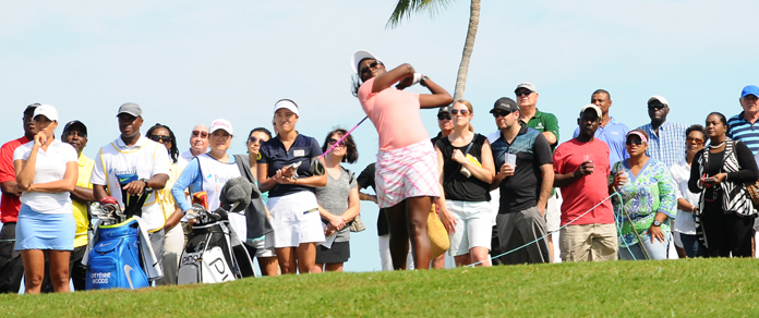 Bahamian golfer Georgette Rolle teeing off Thursday morning to a swelling crowd, in the qualifying round of the Pure Silk-Bahamas LPGA Classic at the Ocean Club Golf Course, Paradise Island, January 25-31, 2016.  (BIS photo/Kemuel Stubbs)