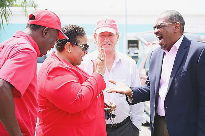 Former Deputy Leader Loretta Butler Turner greeting Dr. Hubert Minnis.