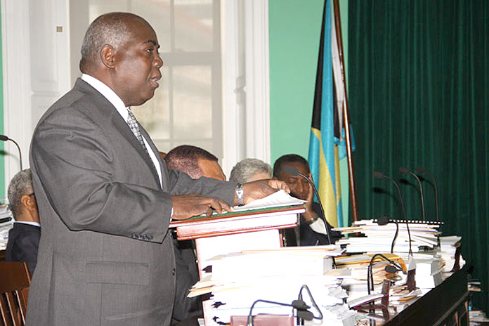 Deputy Prime Minister and Minister of Works and Urban Development the Hon. Philip Davis, announces Management Services Agreement for BEC in the House of Assembly on February 3, 2016. (BIS Photo/Patrick Hanna)
