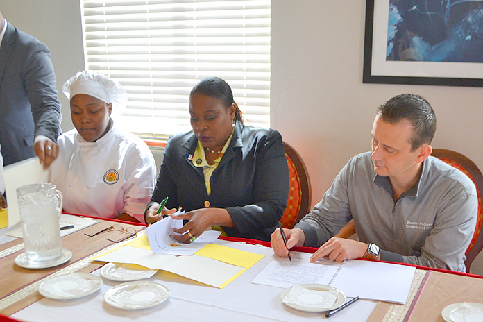 Chef Addiemae Farrington, Apprentice Coordinator CHMI, Mr. Clarence Albury, Director of Training & Development, Lyford Cay Club, Katiusia Johnson, Student Apprentice, COB, Dr. Sophia Rolle, Interim Executive Director, CHMI and Chef Pascal Hollander, Director of Cuisine & Operations, Lyford Cay Club.