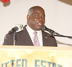 The Deputy Prime Minister and Minister of Works and Development the Hon. Philip Davis gives remarks at the retirement ceremony for Paul Turnquest, former educator. (BIS Photo/Patrick Hanna)