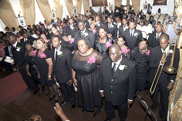 Photos show Patient Care Assistant programme graduates during musical rendition