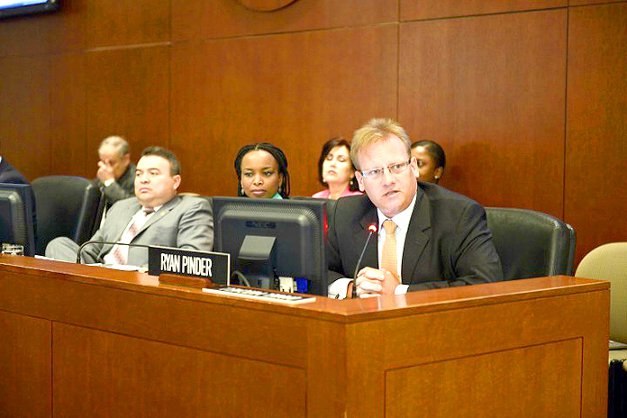 Ryan Pinder (right), former Bahamas Financial Services Minister and Member of Parliament for the Elisabeth Constituency in New Providence, addressing a special meeting of the Permanent Council of the OAS on Wednesday, March 30, 2016. Also pictured from left are: OAS Assistant Secretary General Nestor Mendez and Ms. La Celia A. Prince, Chief of Staff to the OAS Assistant Secretary General. (Photo by Juan Manuel Herrera/OAS). 