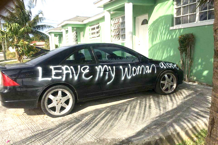 Vandal leaves message on a car.