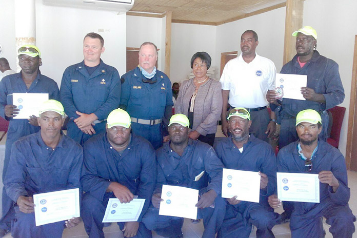 The National Emergency Management Agency (NEMA) in partnership with the United States Northern Command (USNORTHCOM) and the United States Public Health Services trained 12 individuals in water rescue techniques held May 9-12, 2016. The course participants were:  Anthon Miller, Royal Bahamas Police Force; Devaughn Newry, Royal Bahamas Police Force, Darrel Moss, Department of Environmental Health Services; Edward Ferguson, Department of Environmental Health Services; Thomas Thompson, driver; Oniel Gilbert, Romeiko Burrows, Royal Bahamas Defence Force; Rueben Ferguson, Department of Environmental Health Services; Kenneth Scavella, Bonefish Guide; and Derick Ingraham, Fisherman. Pictured amongst them are Commander Kiel Fisher, US Department of Health and Human Services; Captain John Holland, US Department of Health and Human Services; Family Island Administrator Francita Neely; and Captain Stephen Russell, Director, NEMA.