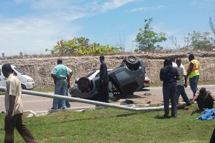 the scene today of that traffic fatality on the JFK airport road corridor which left two dead after being thrown outside the vehicle.