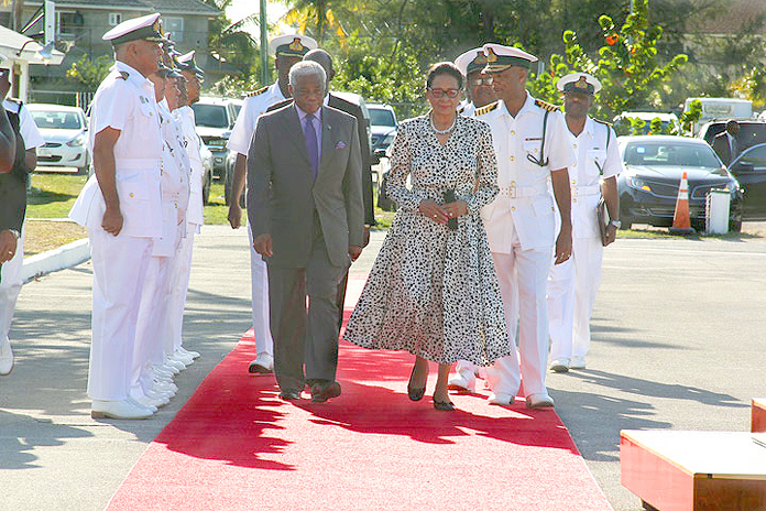 Her Excellency Dame Marguerite Pindling, Governor-General, arrives at the RBDF Coral Harbour Base escorted by Minister of National Security the Hon. Dr. Bernard Nottage, left, and RBDF Commander (Actg.) Captain Tellis A. Bethel, right, Tuesday morning, May 10, 2016.