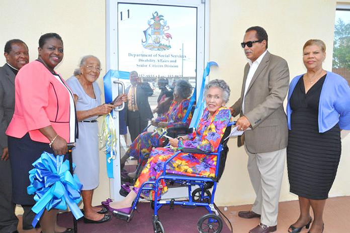 As a part of the official opening of the Department of Social Services Disability Affairs and Senior Citizens Divisions of the Ministry of Social Services and Community Development on Friday, May 13, 2016 there was a ribbon cutting ceremony. Shown from left are: Pastor Peter Pinder, president, Grand Bahama Christian Council; the Hon. Melanie Griffin, Minister of Social Services and Community Development; Ms. Jacqueline Bowe, a 95-year-old resident of Holmes Rock, West Grand Bahama; Lady Laurie Miller; Russell Miller, son of Lady Laurie; and Mrs. Lillian Quant-Forbes, Senior Deputy Director, Ministry of Social Services and Community Development. (BIS Photo/Vandyke Hepburn)