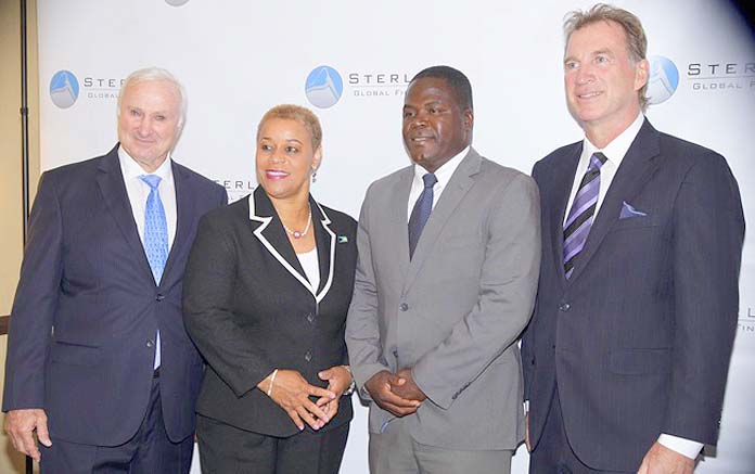 At launch from left: Sterling Global Financial Chairman David Kosoy; Minister of Financial Services the Hon. Hope Strachan; Minister of State for Investments the Hon. Khaalis Rolle; and Sterling Financial’s President Steve Tiller.   (BIS Photo/Derek Smith) 