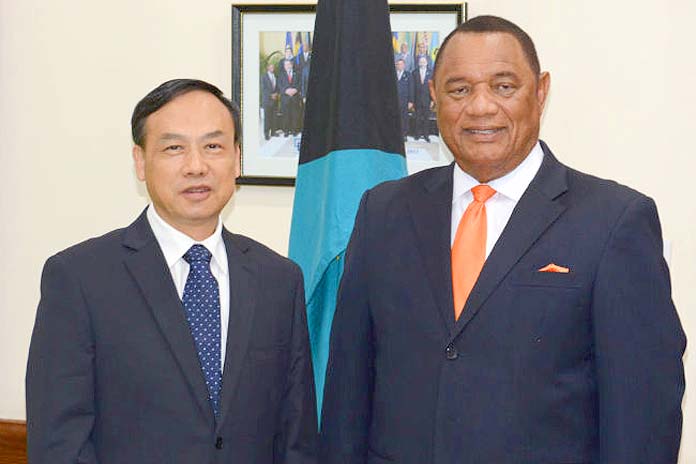 PM Christie along with China's Ambassador HE Huang Qinguo.