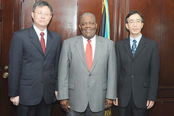 Former Prime Minister, the Rt. Hon. Hubert Ingraham met with the first official Chinese delegation to visit The Bahamas in 2008. From left are: Ju Lidong, Director-General; International Department of the Central Committee Communist Party of China, Prime Minister Ingraham and His Excellency Hu Ding Xian, Ambassador Extraordinary and Plenipotentiary from the People's Republic of China to The Bahamas. (BIS Photo/Peter Ramsay) 	