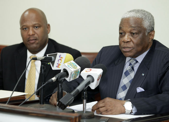 Minister of National Security, the Hon. Dr. Bernard J. Nottage (right) addressed members of the media during a press conference Tuesday at the Ministry of National Security.  Also pictured is Minister of State for National Security, Senator the Hon. Keith Bell.   (BIS Photo/Derek Smith)