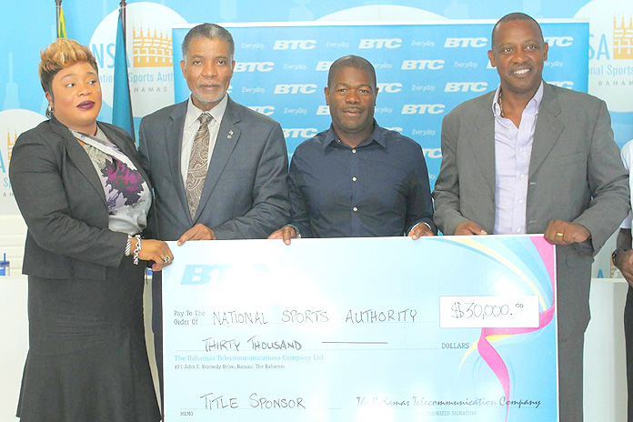 BTC presents $30,000 cash and in-kind cheque to the National Sports Authority for the Haiti vs. Jamaica Soccer Match. Left to Right: Eldri Ferguson-Mackey, BTC Vice President Marketing, Brand and Communications, Leon Williams, BTC CEO, Lynden Maycock, Chairman, National Sports Authority and Anton Sealy, Secretary General, Bahamas Football Association.