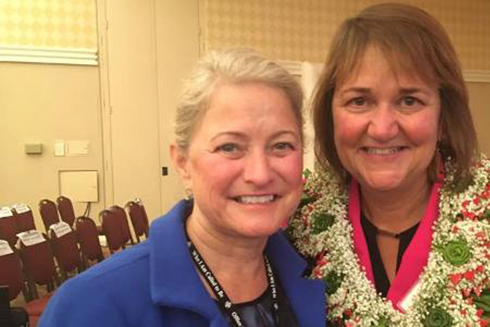 Bishop Karen Oliveto [Right] with her wife Robin Ridenour. WELL WAIT!