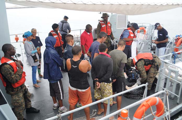 RBDF Marines conducting a thorough search of Cuban Migrants and their personal items aboard Defence Force patrol craft, HMBS Lignum Vitae. (Photo: Able Seaman Drissen Brennen)