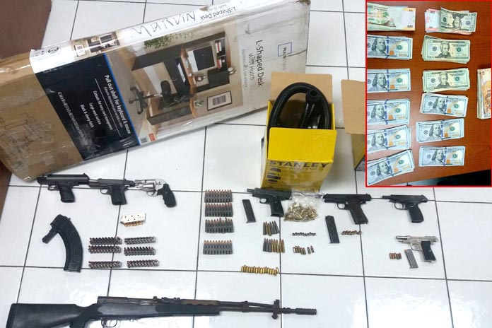 Weapons and cash found by police. One suspect under arrest.