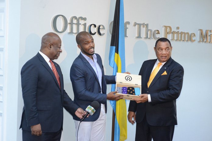 Prime Minister Christie, Businessman Jerrel Hall and Minister Obie Wilchcombe.