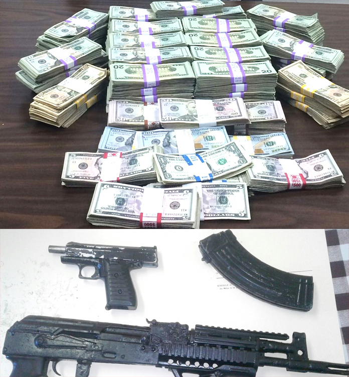 Money and weapon seized in Long Island.
