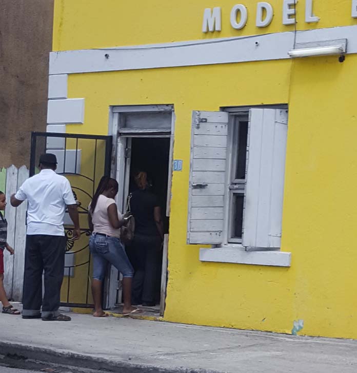Bahamians lineup outside Model Bakery as Hurricane Matthew approach the Bahamas.