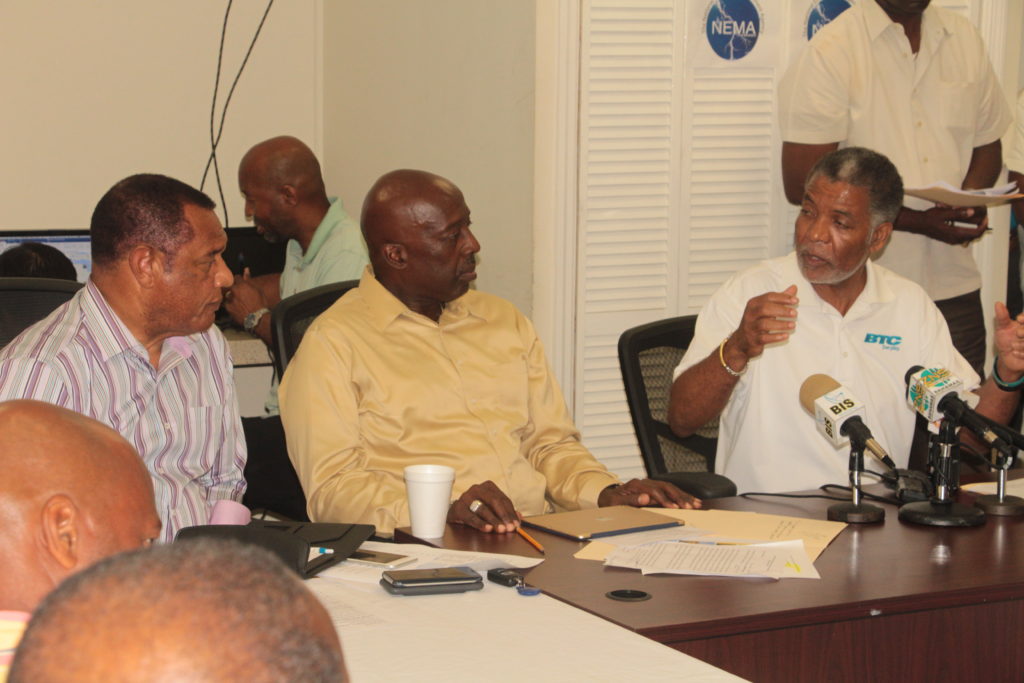Leon Williams, CEO of BTC giving an update  on the telecommunications restoration efforts following the passage of Hurricane Matthew, at a press conference held Sunday, October 9, 2016 at NEMA on Gladstone Road. Picture left is the Rt Hon Perry Christie, Prime Minister, and the Hon Shane Gibson, Coordinator for the Hurricane Matthew Relief and Recovery efforts. (BIS Photo/Eric Rose)